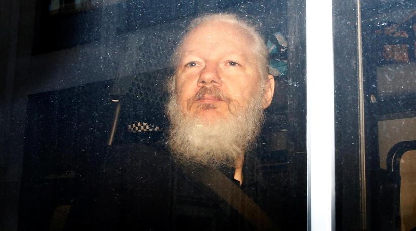 Ecuador's president says Assange tried to use its embassy to spy