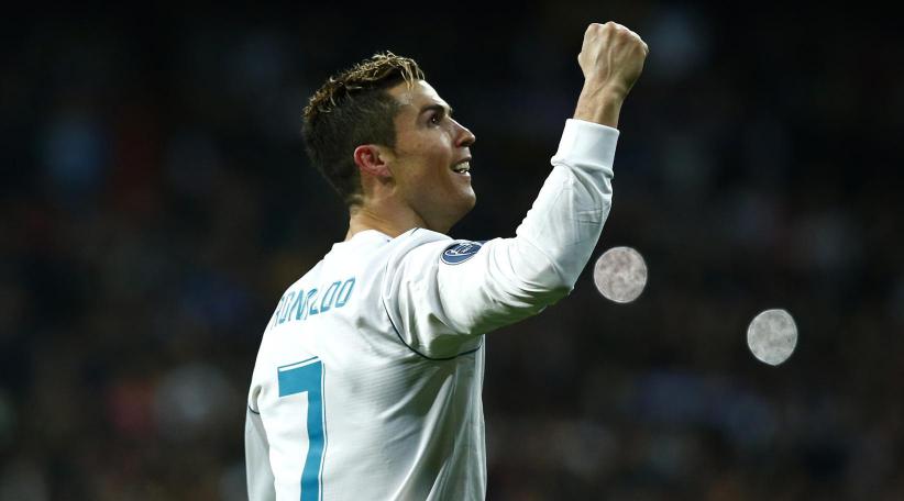 Real Madrid beats PSG 2-1 to reach Champions League quarters