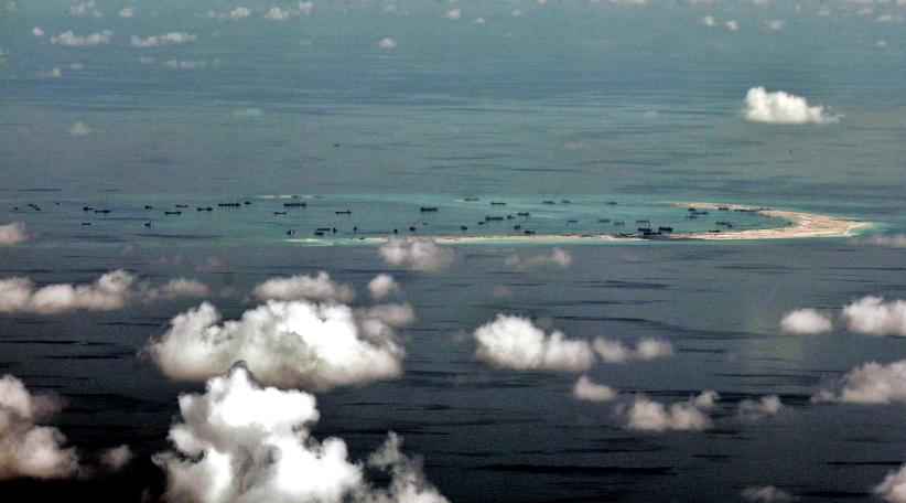 Chinese air force holds drills over South China Sea, Western Pacific 