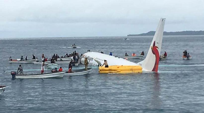 Air Niugini plane overshoots runway in Micronesia and sinks in sea lagoon