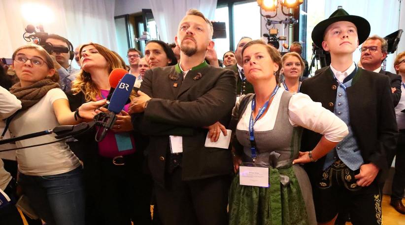 Angela Merkel allies in Bavaria humbled in historic vote, threatening more turbulence on national scene