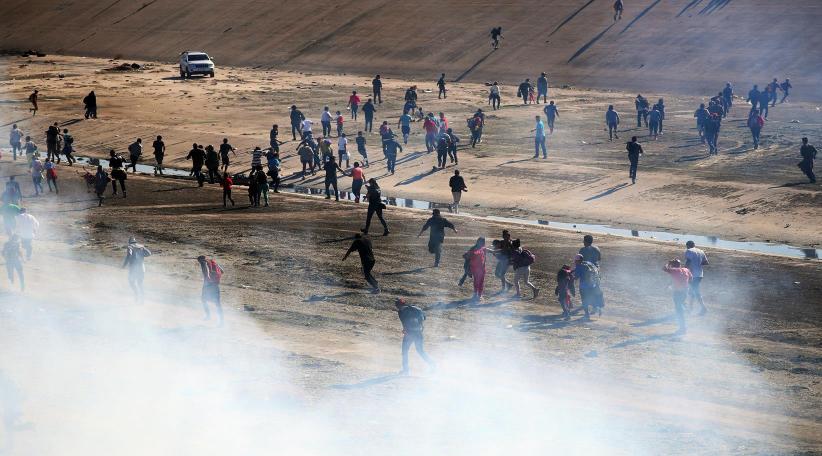 U.S. fires tear gas into Mexico to repel migrants.  Mexico to deport group which stormed US border