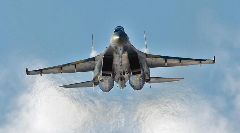 A Reuters witness saw the jets land at Belbek air base in Crimea,