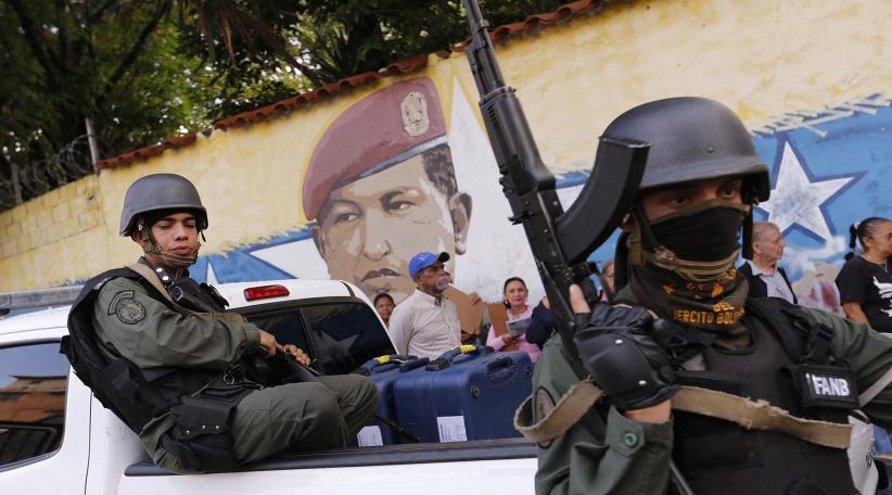 Venezuelan troops open fire near border as aid standoff intensifies