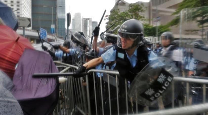 Hong Kong police fire rubber bullets as protests turn to violent chaos