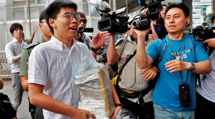 Freed Hong Kong democracy activist joins mass calls for leader to quit