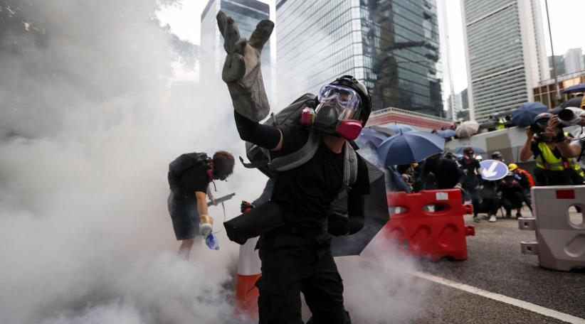 Hong Kong protests turn to chaos amid tear gas and petrol bombs