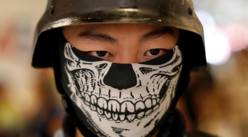 Hong Kong police get more powers, masks to be banned in bid to end crisis