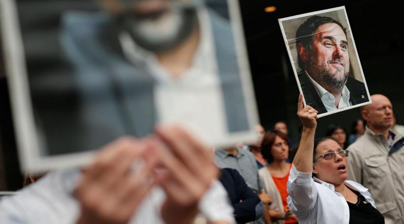 Catalan separatist leaders given lengthy prison sentences