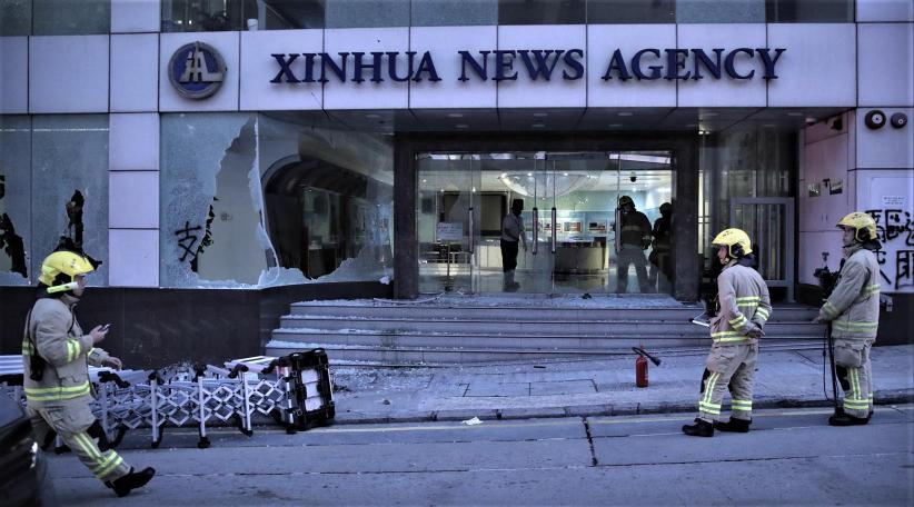 Hong Kong protesters trash Xinhua agency office in night of violence