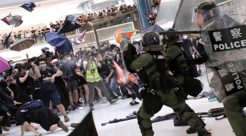 Hong Kong shopping mall clashes end in bloodshed