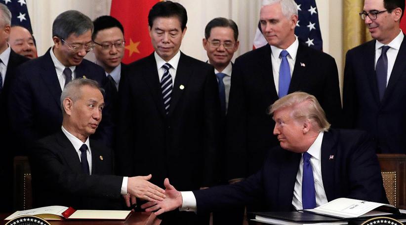 US and China sign deal to ease trade war