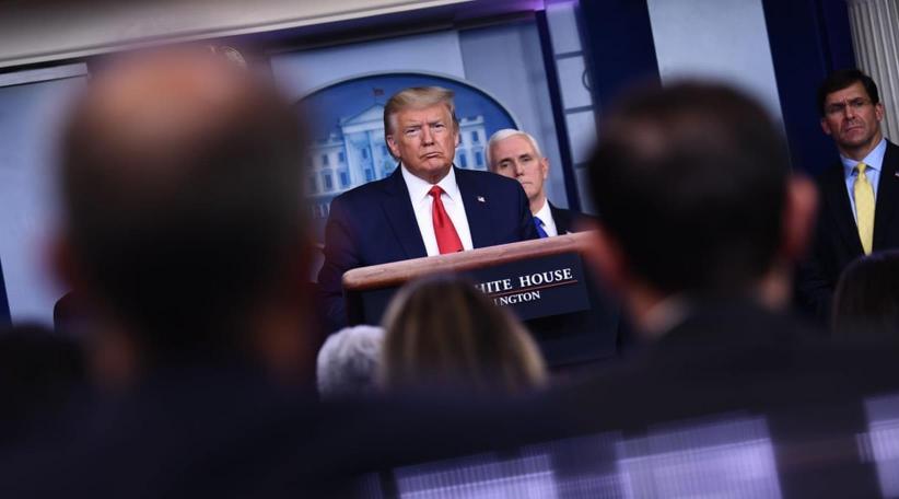 Trump says he will invoke wartime act to fight 'enemy' coronavirus