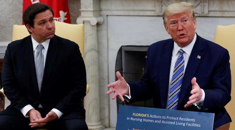 Trump says he may order virus tests for international travelers