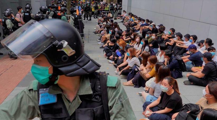 Hong Kong police arrest 300 as thousands protest over security laws