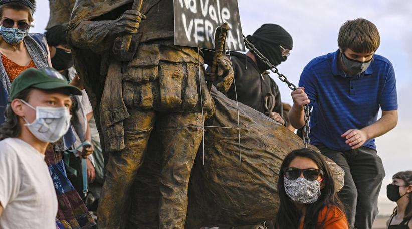 Man shot as New Mexico protesters try to remove Spanish conquistador statue