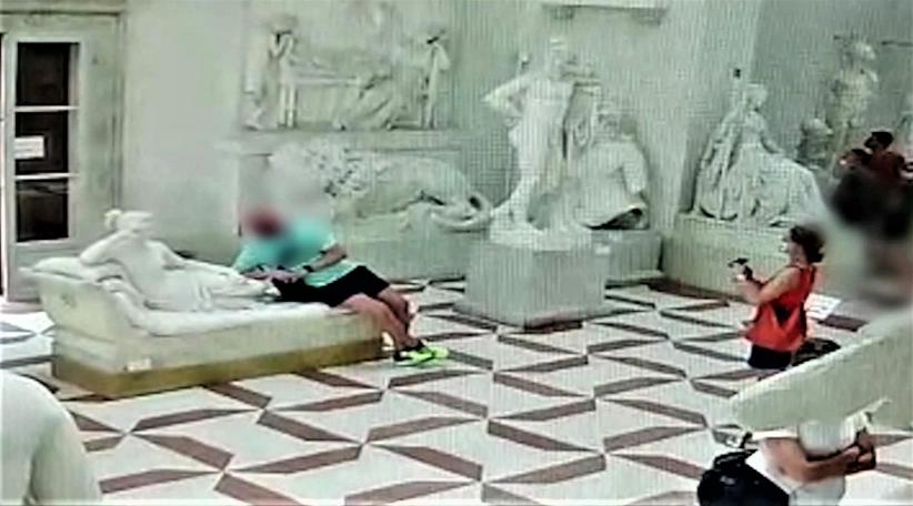 Italy Tourist posing for photo breaks 19th Century Antonio Canova sculpture