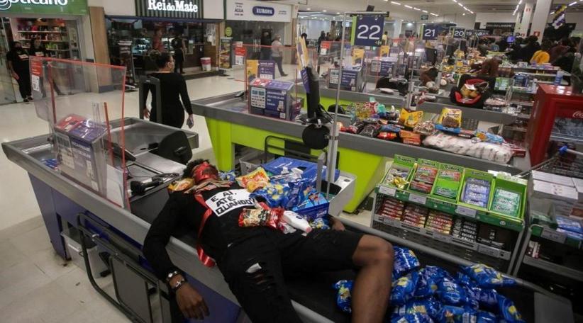 Protests erupt in Brazil after black man dies after being beaten outside supermarket