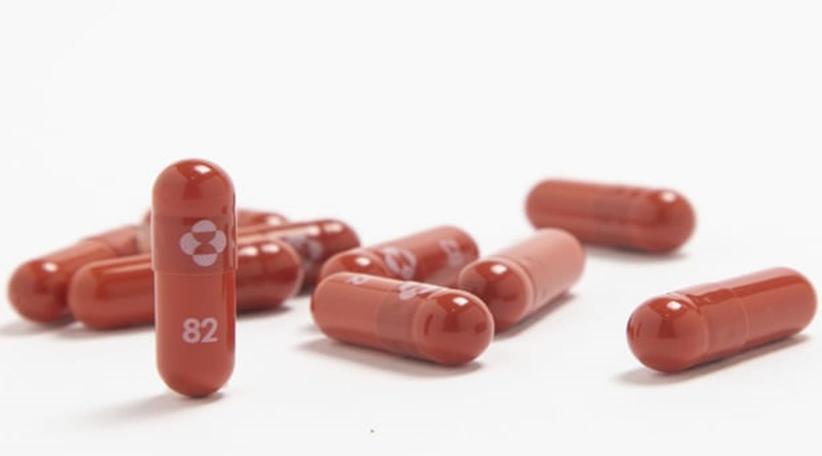 Merck's COVID-19 pill cuts risk of death, hospitalization by 50% in study