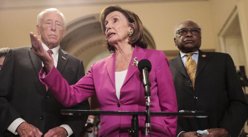Democrats pass Joe Biden’s $1tn infrastructure bill after chaotic day