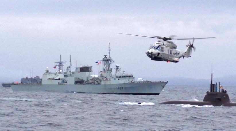 NATO sends ships and jets to eastern Europe in Ukraine crisis