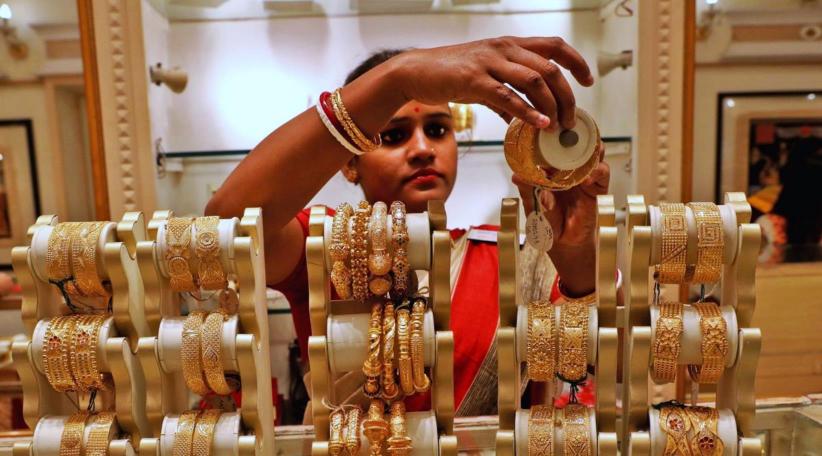 India raises import tax on gold to support rupee