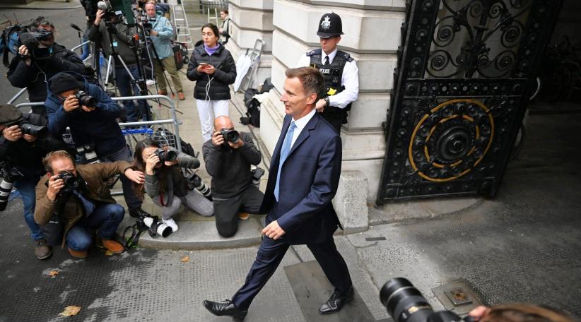 As UK's Truss fights for her job, new finance minister warns of tough decisions