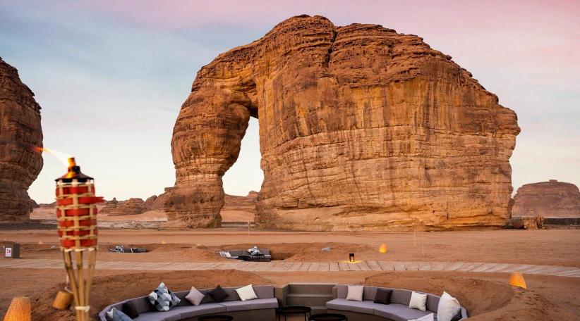 An evening in front of the majestic Elephant Rock in the AlUla Desert, Saudi Arabia