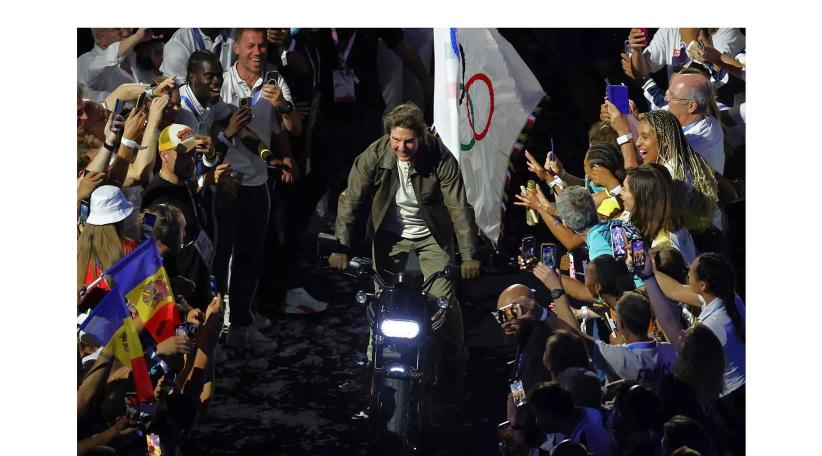 Tom Cruise closed the Paris Olympics by jumping off the roof and took the torch to Los Angeles on a motorcycle