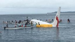 Air Niugini plane overshoots runway in Micronesia and sinks in sea lagoon