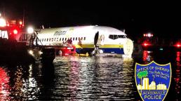 Boeing 737 slides off runway into Florida river, 21 hurt