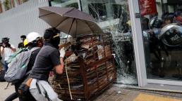 China condemns violent Hong Kong protests as 'undisguised challenge' to its rule