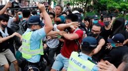 Hong Kong activists protesting Chinese traders clash with police