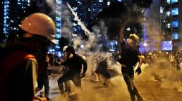 China warns Hong Kong protesters will be 'punished' and refuses to rule out military intervention
