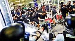 Chinese forces exercise across border as Hong Kong braces for protests