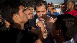 Venezuela: Juan Guaidó greeted with abuse after return from world tour