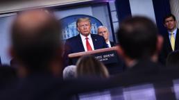 Trump says he will invoke wartime act to fight 'enemy' coronavirus