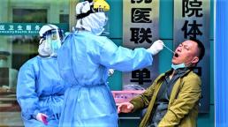 Coronavirus updates: China denies cover-up as Wuhan death toll revised up by 50%