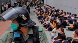 Hong Kong police arrest 300 as thousands protest over security laws