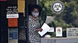 America's unemployment rate falls to 13.3% as economy posts surprise job gains