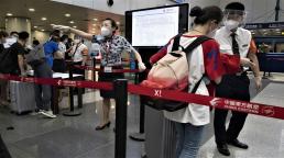 Beijing coronavirus outbreak: city raises emergency level and grounds hundreds of flights