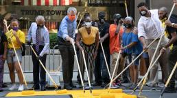 New York City mayor helps paint 'Black Lives Matter' outside Trump Tower