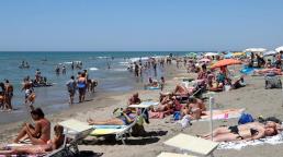 Coronavirus brings tension and prejudice to Italy's beaches