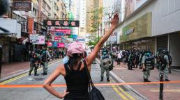Hong Kong outcry as activists arrested and pro-democracy candidates banned
