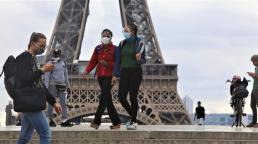 France brings in 9pm curfew for Paris region and eight other cities