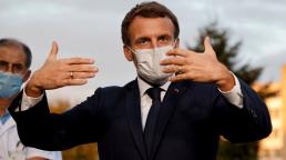 Virus to stay 'at least until next summer' - France's Macron