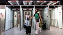 England eases COVID testing rules for air travelers