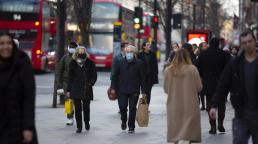 England drops compulsory mask wearing in shops, vaccine certificates and work from home guidance
