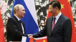 Putin and Xi proclaim bond as Russia deploys more forces near Ukraine