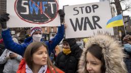 U.S., allies target 'fortress Russia' with new sanctions, including SWIFT ban